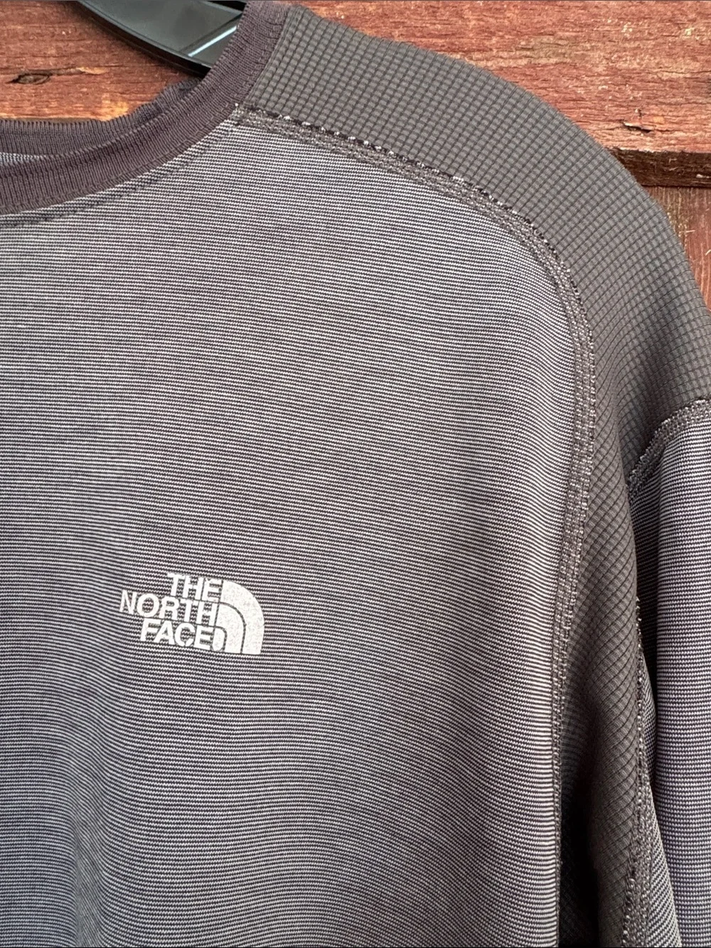 The North Face marled gray waffle inserts stretch athleisure shirt. Large.
